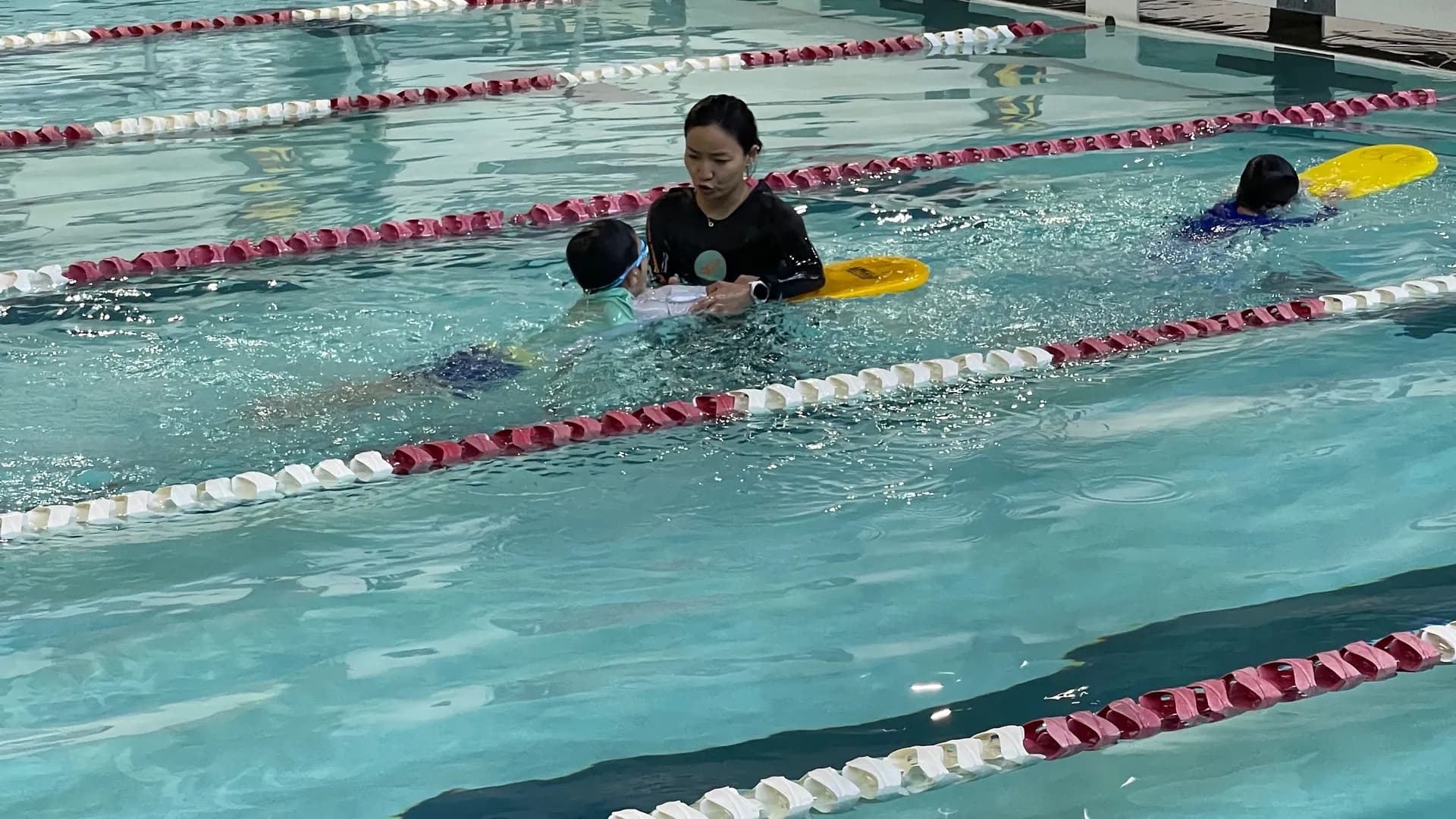 Children swimming at Tina's Swim Camp